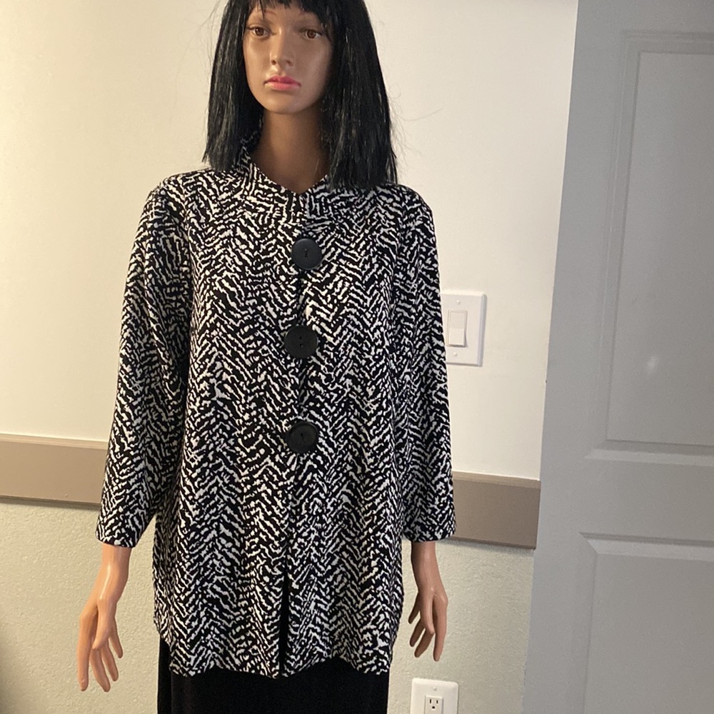 A jacket and may be as a blouse. .without lining